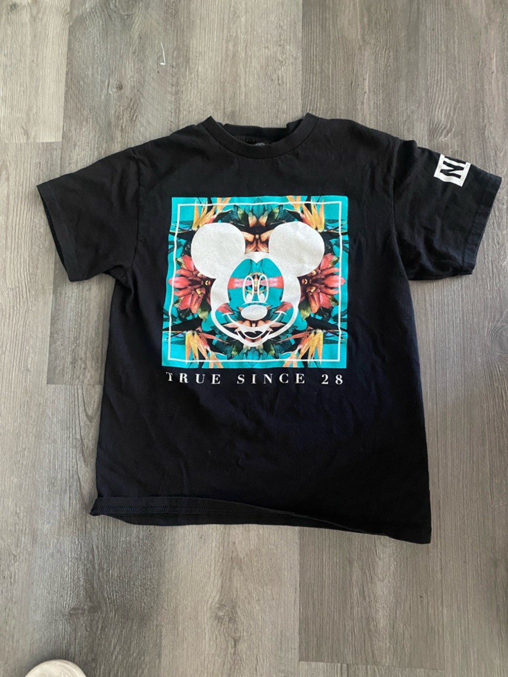 Neff Black Short Sleeve Tee with Turquoise Floral Graphic